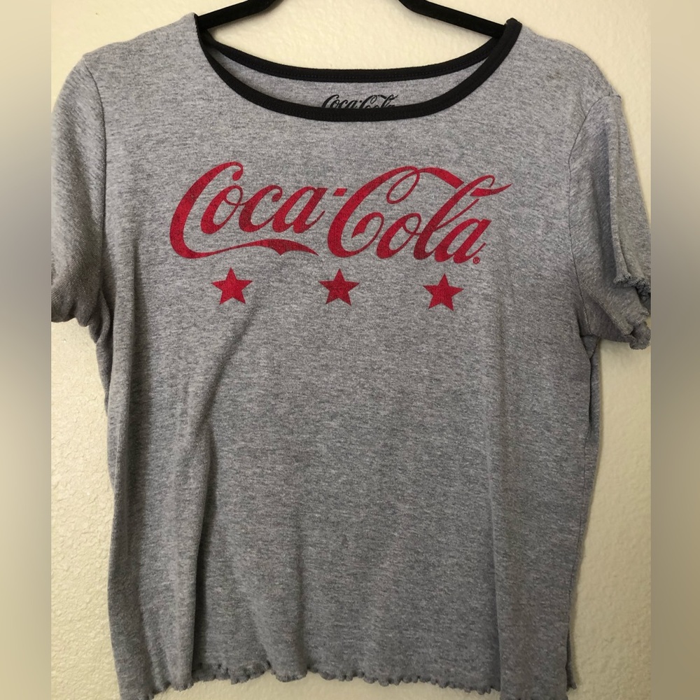 Gray t-shirt with red Coca-Cola letters and stars